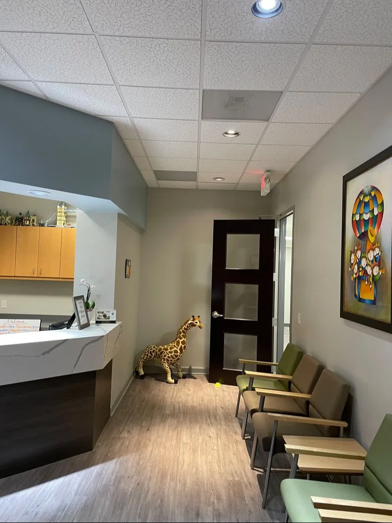 The welcoming, kid-friendly lobby with a giraffe at Children's Dentistry, Atlanta
